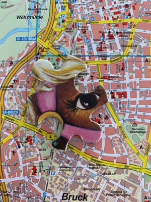 Stadtplanausschnitt mit Puzzlestück